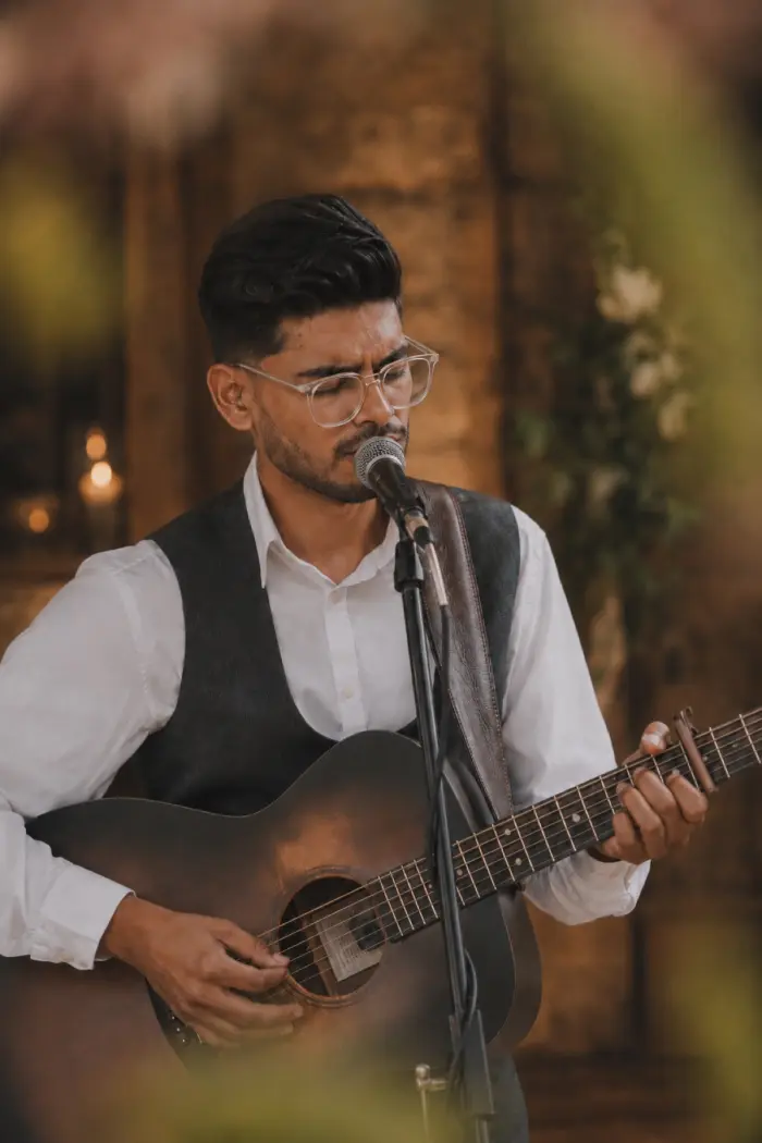 Puskar performing live acoustic music outdoors